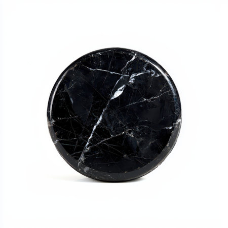 Elegant Dark Marble Round Plate with Unique Natural Veining Patterns on Smooth Black Surface for Home Decor or Kitchen Displayの素材
