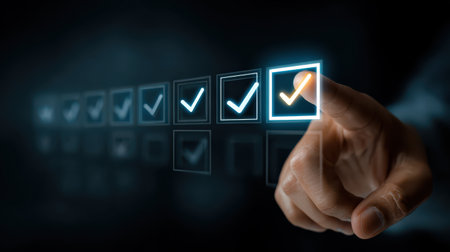 Hand Clicking on Digital Checkbox with Glowing Checkmark Symbol in a Dark Background, Representing Success, Confirmation, and Task Completionの素材
