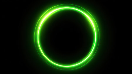 Vibrant Green Neon Circle Glow on Black Background Ideal for Abstract Designs, Technology Themes, or Futuristic Conceptsの素材