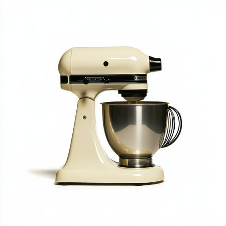 Elegant cream-colored mixer with stainless steel bowl, perfect for baking enthusiasts and kitchen settings, showcasing modern kitchen appliance designの素材