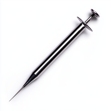 Stainless Steel Hypodermic Needle on a White Background for Medical and Health-Related Concepts, Syringe Use, and Injection Proceduresの素材