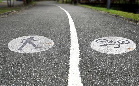 Two lanes with a walkway and bicycle pathの写真素材
