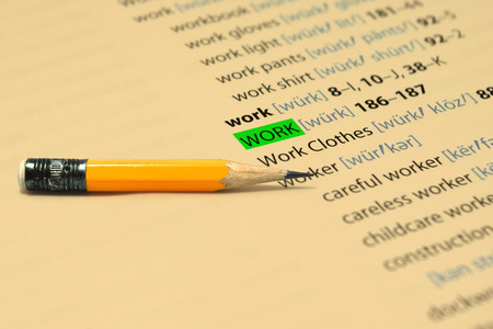 WORK - The words highlight in the book and pencil