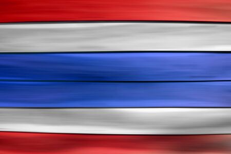 Red white blue Thailand flag  on wood sheet backgroundの写真素材