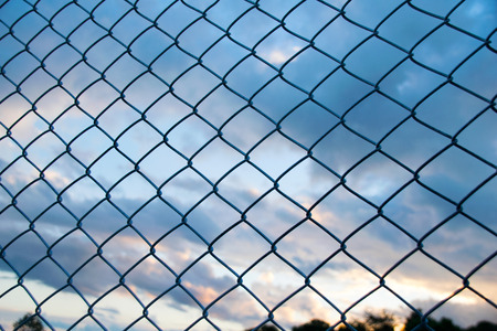 Steel Wire mesh and cloud  in Evening Sky background