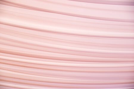 Soft pink fabric texture wave abstract backgroundの写真素材