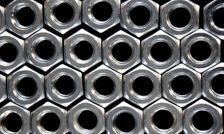 Close up hex nuts put row abstract style
