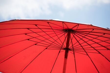 Close up Red umbrella for outdoor and skyの写真素材