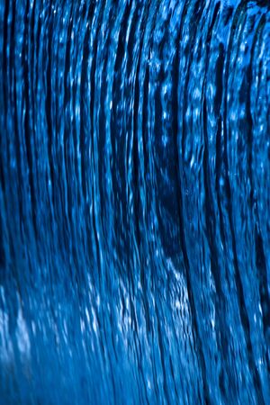 Close up Blue Water fall nature abstract texture backgroundの写真素材
