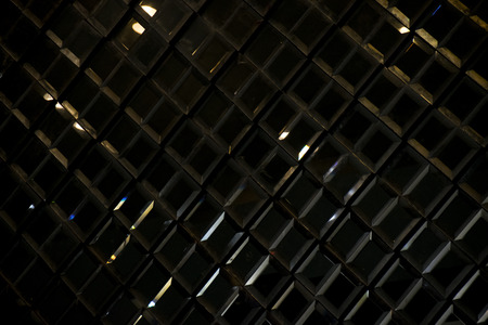 Dark black Reflective glass rhombus diamond abstract texture and backgroundの写真素材