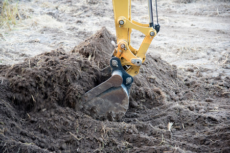Close up bucket of Excavator backhoe Loader