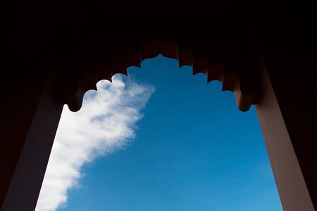 Indian Style Door and sky with cloudsの写真素材