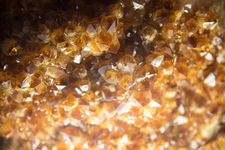 Close up Yellow Topaz Crystal raw stoneの写真素材