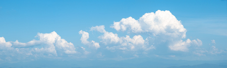 Panorama view of white soft Fluffy clouds and blue skyの写真素材