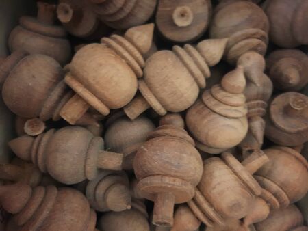 pile of cut wooden chip woodchip in container invarious different shapes round triangle circleの写真素材