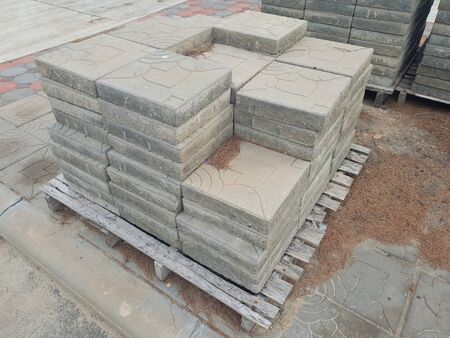 Drawing shape textured Paver stone regular blocks lay on the pallet at the road side walkの写真素材