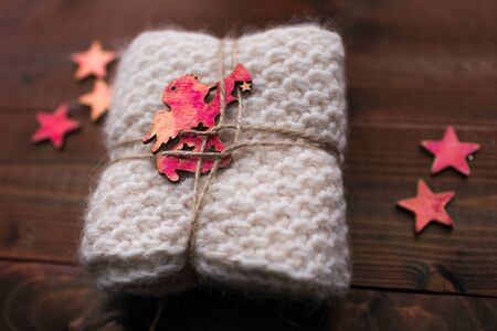 Knitted snood with stars and angel look like gift