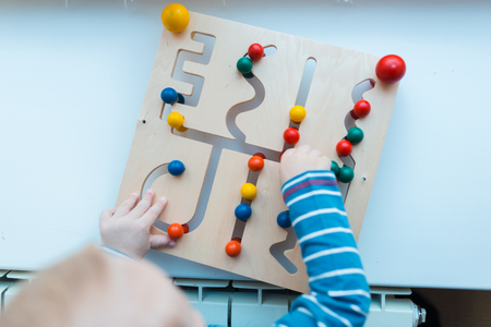 A child plays with educational games. Constructorsの写真素材