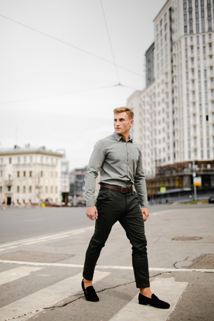 Handsome man posing in the city for clothes shootingの写真素材