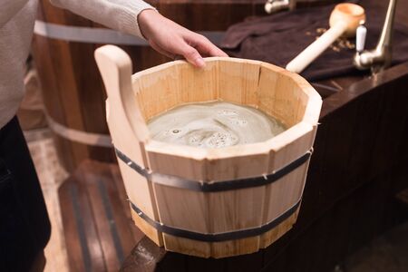 Wooden bath accessories in the saunaの写真素材