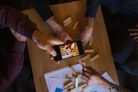 A man takes photos of them playingの写真素材