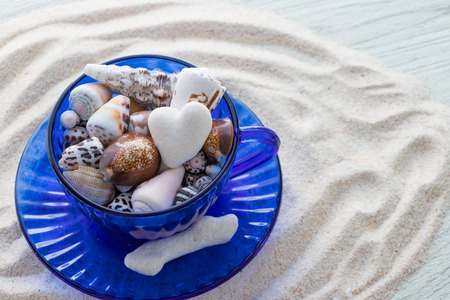 Teacup packed with tropical memoriesの写真素材
