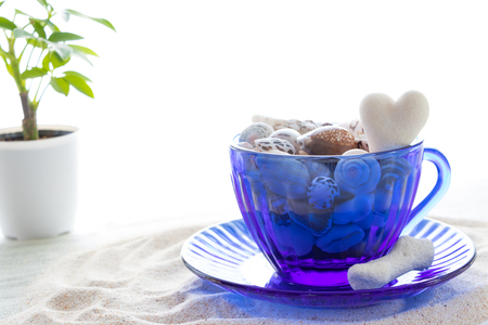 Teacup packed with tropical memoriesの写真素材