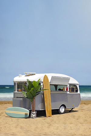 Surfing fast food truck, old caravan on the beach, vertical template with copy space