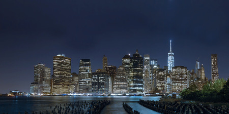 Night panorama of New York City Manhattan island from Green pointの写真素材