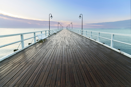 Wooden pier at sea shore, morning view, Gdynia Orlowo polandの写真素材