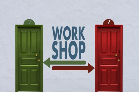 where is the workshop behind the red or the green door? A concept image showing two closed doors with a workshop sign painted on the wall in betweenの写真素材
