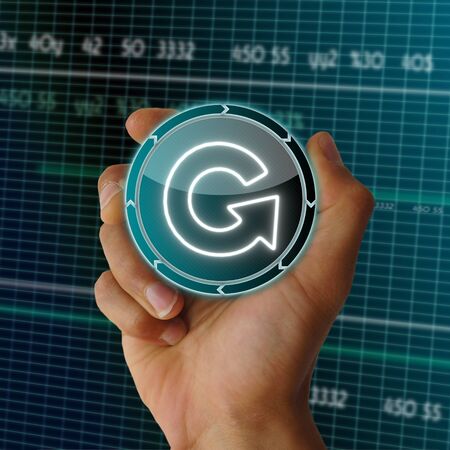 a hand presents future round button with a repeat icon on it in front of a electronic data table from stock marketの写真素材