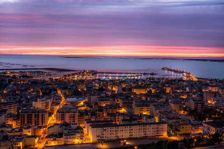 Panoramic view from the above of Sant Carles de la Rapita, Spain just before a dramatic sunriseの写真素材