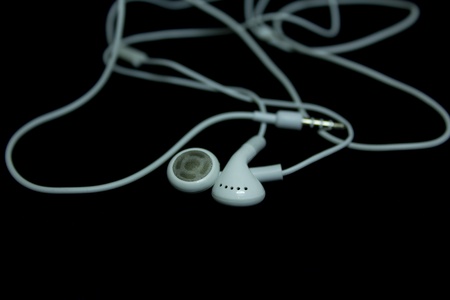 Earphones on a black backgroundの写真素材
