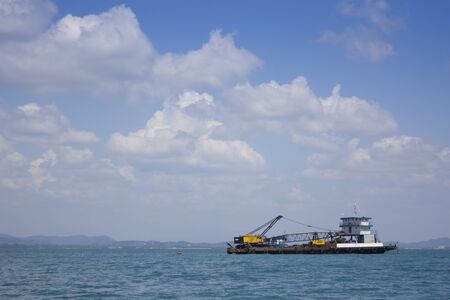 The crane parked on a vessel in the seaのeditorial素材