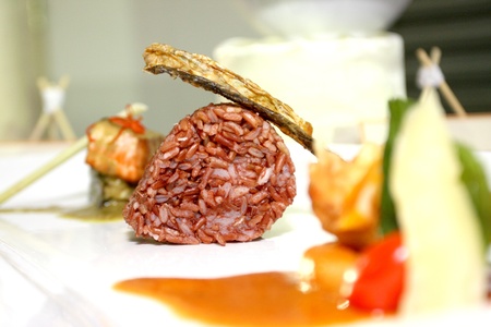 black sticky rice and fried skin fish の写真素材