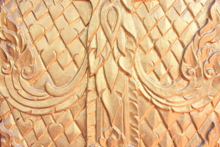 thai traditional door wood carvings in wat yai chaimongkolの写真素材