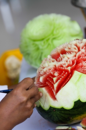 Craftsman is carving a watermelonのeditorial素材