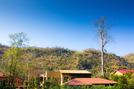 Small city and blue sky in suburb, Thailand