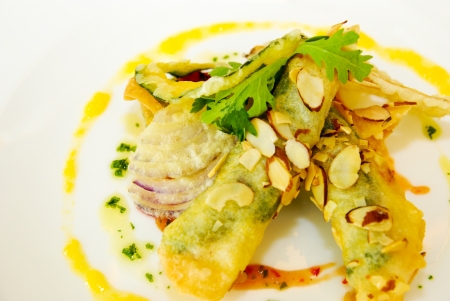 Vegetables fried or tempura with salad sauceの写真素材