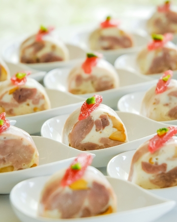 Roasted pork in the small bowl for the cocktail receptionの写真素材