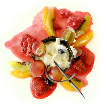 Fruit salad with vanilla ice creamの写真素材