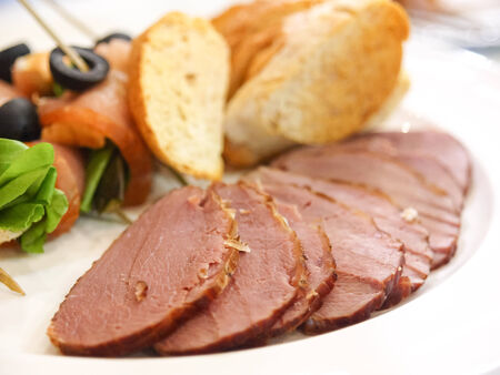 Fillet steak and smoke salmon with breadの写真素材