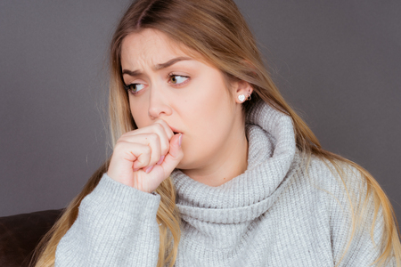 a gild is sick and needs care for her health and has painの写真素材