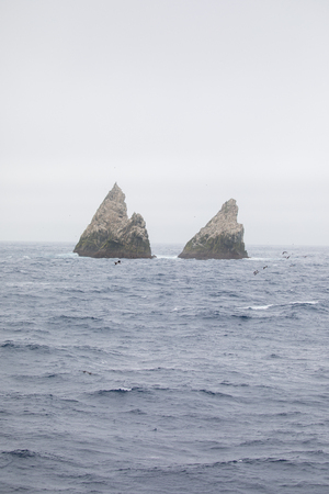 an Antarctica landscape with ice bergs and the ocean icelandの写真素材
