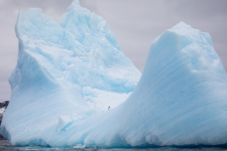 an Antarctica landscape with ice bergs and the ocean icelandの写真素材