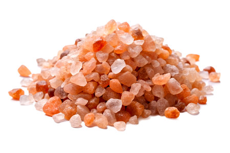 Himalayan pink salt isolated on white background.の写真素材