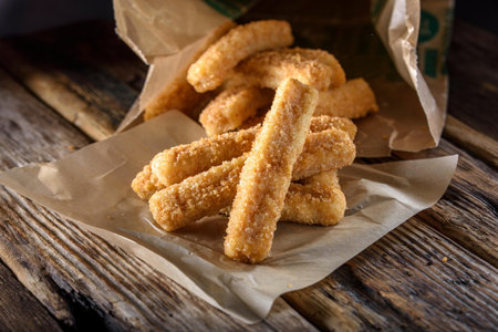 Crispy and Zesty: Panko-Breaded Fish Sticks with Lemon in Exquisite 4K Close-Uの写真素材