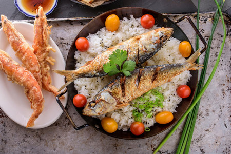 Crispy Delight: Deep Fried Fish over Fluffy White Steamed Rice in 4K Close-Upの写真素材