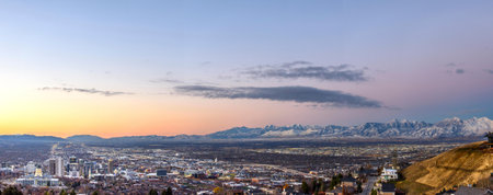 Panoramic view of the city of Salt Lake City at sunsetの写真素材